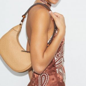 Sleek and Distinctly Tory Burch: The T Monogram Pebble Crescent Bag